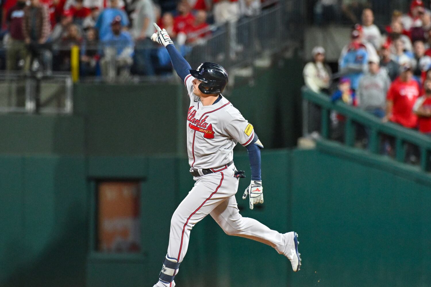 Atlanta Braves’ Austin Riley hits a solo home run against the Philadelphia Phillies during the fourth inning of NLDS Game 4 at Citizens Bank Park in Philadelphia on Thursday, Oct. 12, 2023.   (Hyosub Shin / Hyosub.Shin@ajc.com)