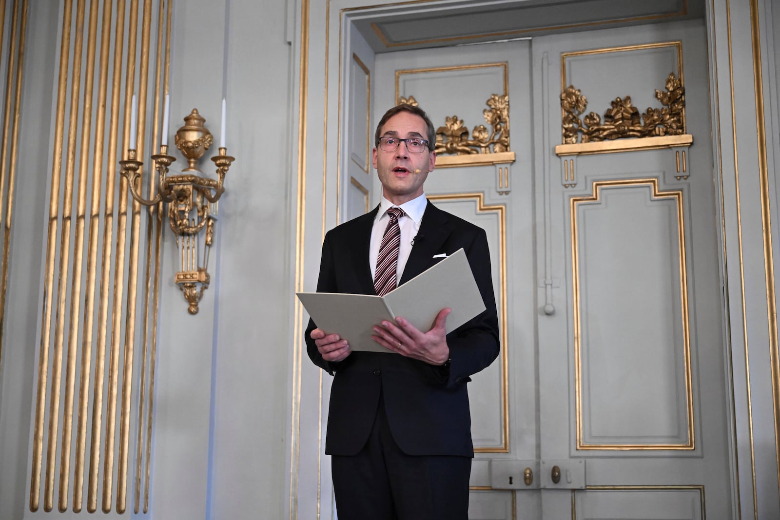 Swedish Academy's permanent secretary Mats Malm announces the winner of the 2024 Nobel Prize in Literature, South Korean writer Han Kang at the Swedish Academy in Stockholm, Sweden, Thursday Oct. 10, 2024. (Jessica Gow/TT News Agency via AP)