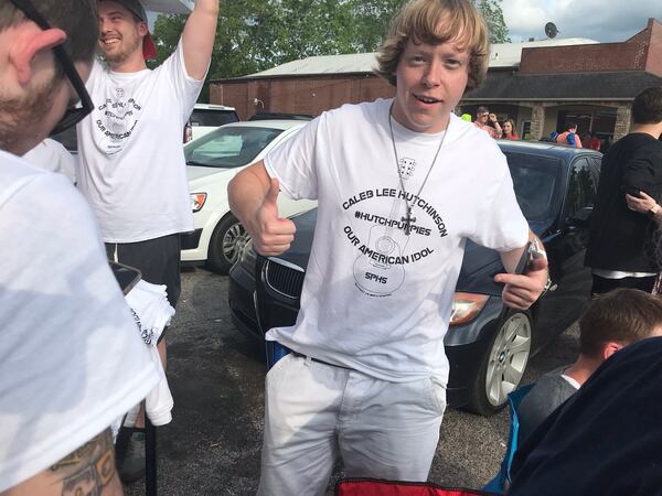  After giving away 600 t-shirts at the pep rally, Devin Harding was hawking shirts for the parade. CREDIT: Rodney Ho/rho@ajc.com