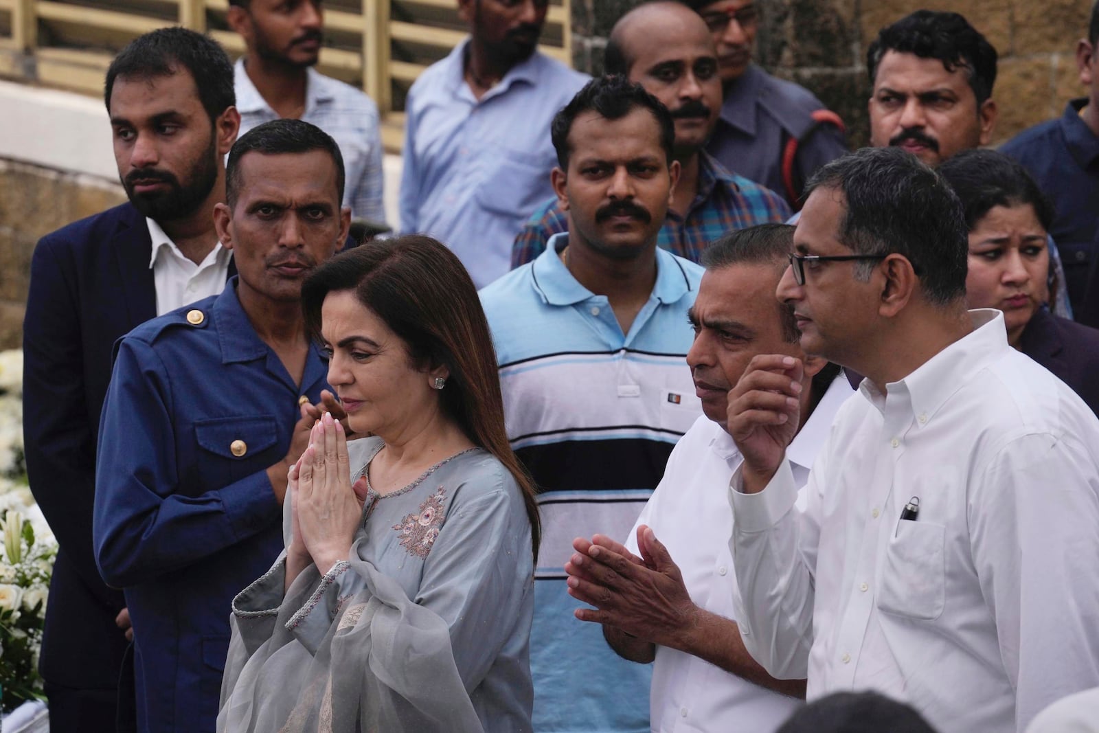 Indian industrialist Mukesh Ambani and his wife Nita Ambani arrive to offer their tribute to Indian business leader Ratan Tata who died on Wednesday night, in Mumbai, India, Thursday, Oct. 10, 2024. (AP Photo /Rafiq Maqbool)