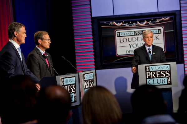 July 13, 2014 Atlanta - U.S. Senate Republican candidates David Perdue (left) and Jack Kingston answer questions from panelists as Dennis O'Hayer moderates during the Atlanta Press Club's Loudermilk-Young Debate Series. AJC/Jonathan Phillips