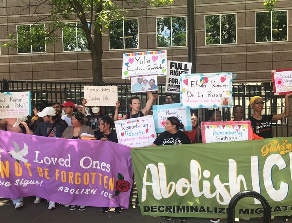 Protesters denounce deaths of immigrant detainees in front of the U.S. Immigration and Customs Enforcement (ICE) Atlanta field office on Monday, July 24, 2023.