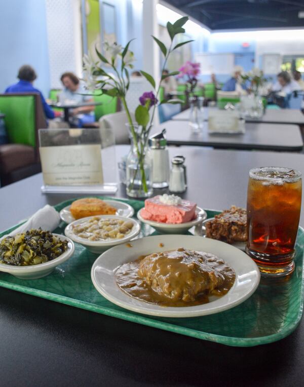 Magnolia Room Cafeteria is a true throwback, with fresh flowers on every table and a cheerful blue and green color scheme. CONTRIBUTED BY HENRI HOLLIS