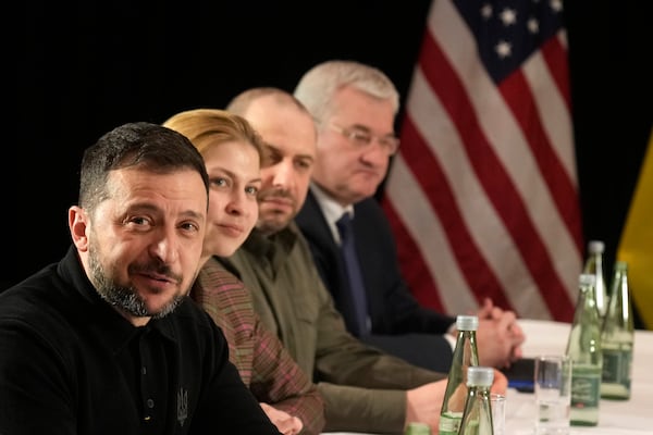 FILE - Ukraine's President Volodymyr Zelenskyy, left, attends a meeting with United States Vice-President JD Vance on the sidelines of the Munich Security Conference in Munich, Germany, Friday, Feb. 14, 2025. (AP Photo/Matthias Schrader, File)