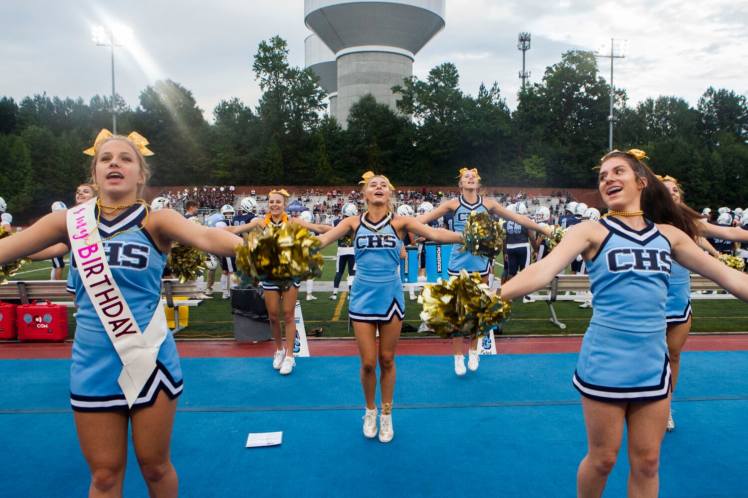 Cambridge cheerleaders cheer during the Cambridge v. Alpharetta high school football game on Friday, September 2, 2022, at Cambridge High School in Milton, Georgia. Alpharetta led Cambridge 28-14 at the end of the first half. CHRISTINA MATACOTTA FOR THE ATLANTA JOURNAL-CONSTITUTION.