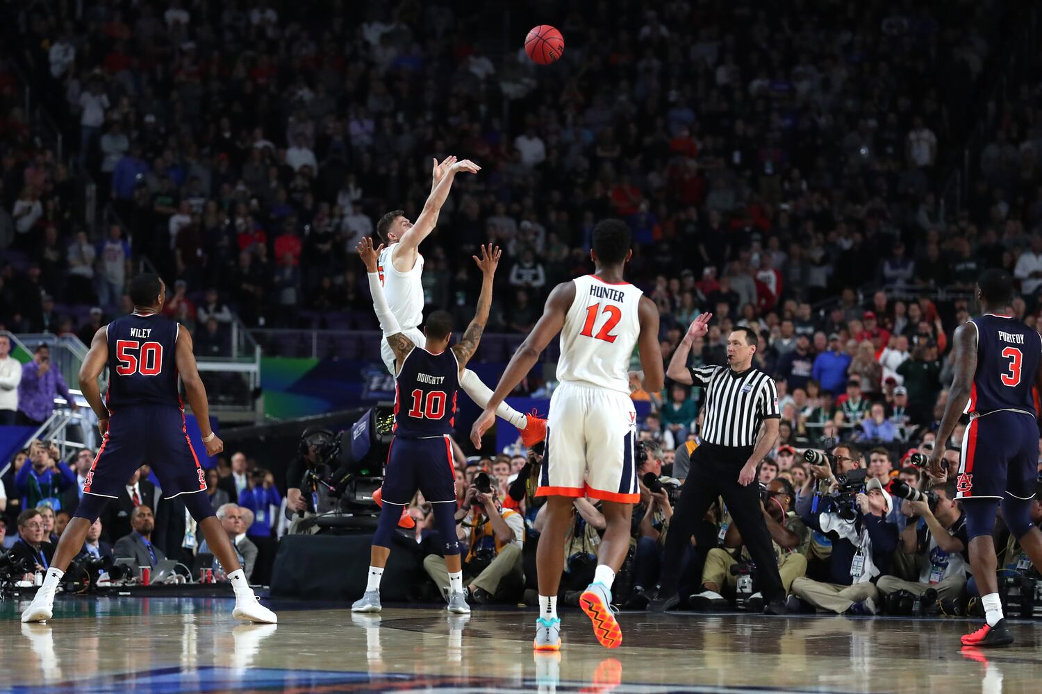 Photos: Did Auburn foul Virginia’s Kyle Guy?