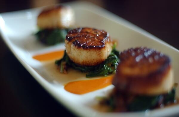  Seared diver scallops at Pacific Kitchen. / AJC file photo