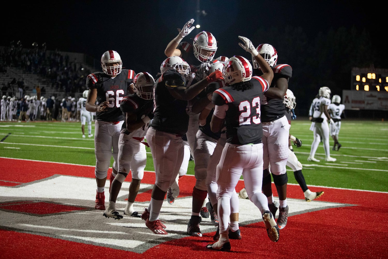 Archer players celebrate at a GHSA high school football game between Archer High School and Norcross High School in Lawrenceville, GA., on Friday, November 5, 2021. Archer won 9-0. (Photo/Jenn Finch)