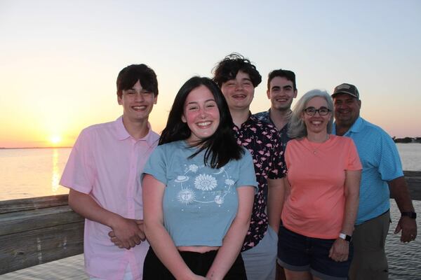 Clara Butler with her parents and three brothers. Butler died from an accidental overdose from a Percocet pill that turned out to be pure fentanyl. (Courtesy of Andrew and Dionne Butler)