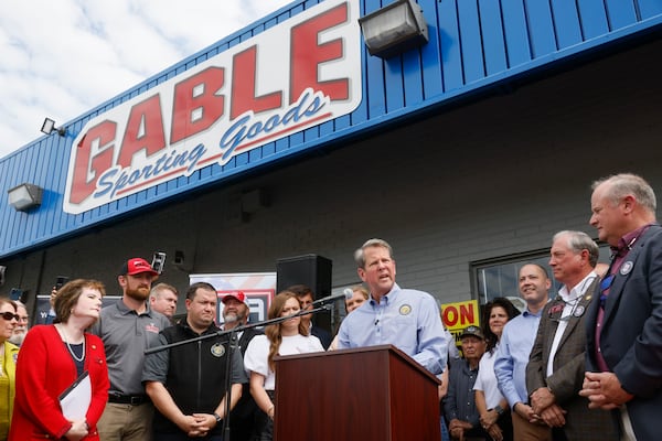 Gov. Brian Kemp speaks before he signed a bill, which will allow permitless carry, at a gun store In Douglasville on Tuesday, April 12, 2022. SB 319 allows a “lawful weapons carrier” to carry a concealed handgun everywhere license holders currently are allowed. (Bob Andres / robert.andres@ajc.com)