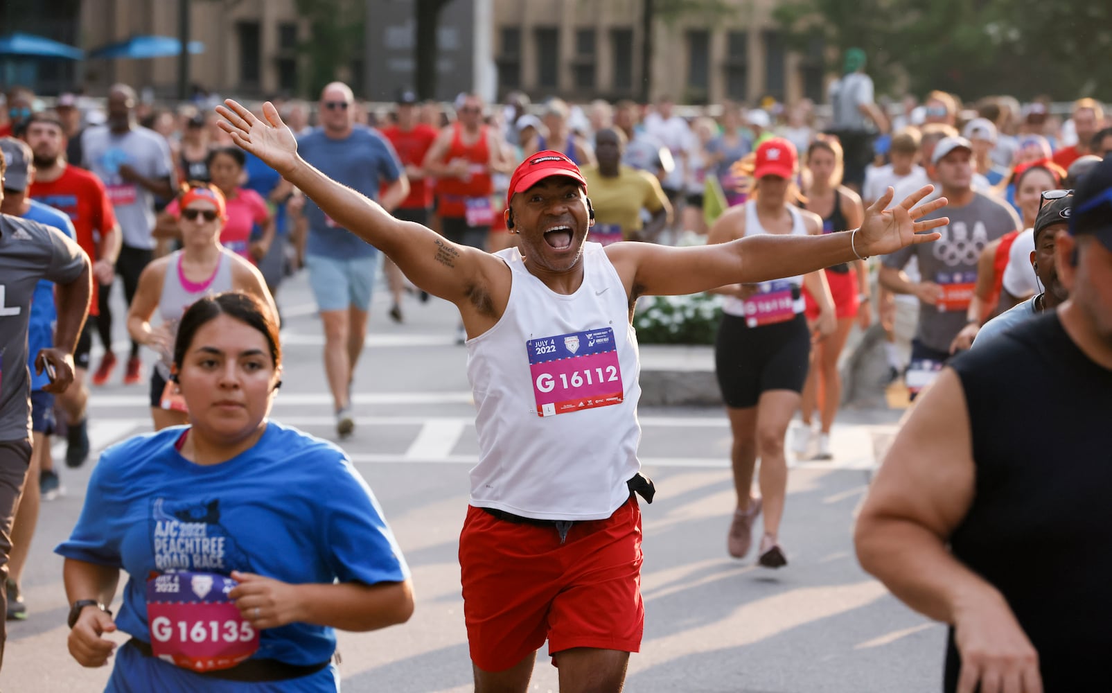 Runners in the 53rd running of the Atlanta Journal-Constitution Peachtree Road Race in Atlanta on Monday, July 4, 2022. (Miguel Martinez / Miguel.MartinezJimenez@ajc.com)