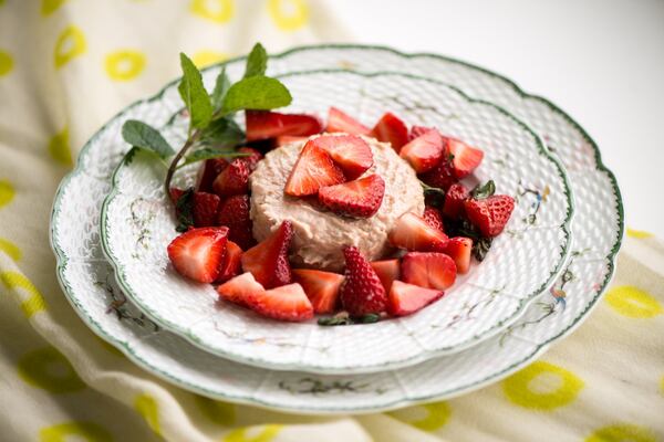 Rhubarb Panna Cotta With Mint and Macerated Strawberries. STYLING BY LISA HANSON / CONTRIBUTED BY MIA YAKEL