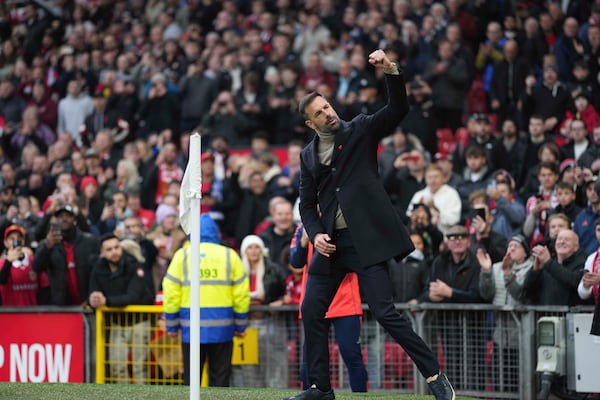 Manchester United's head coach Erik ten Hag gestures prior to the start of the English Premier League soccer match between Manchester United and Leicester City, at the Old Trafford stadium in Manchester, England, Sunday, Nov.10, 2024. (AP Photo/Jon Super)