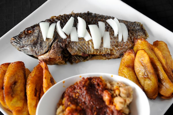 FAD Homeboy Special- beans served with plantains, special beans and pepper sauce with grilled whole fish. (Beckysteinphotography.com)