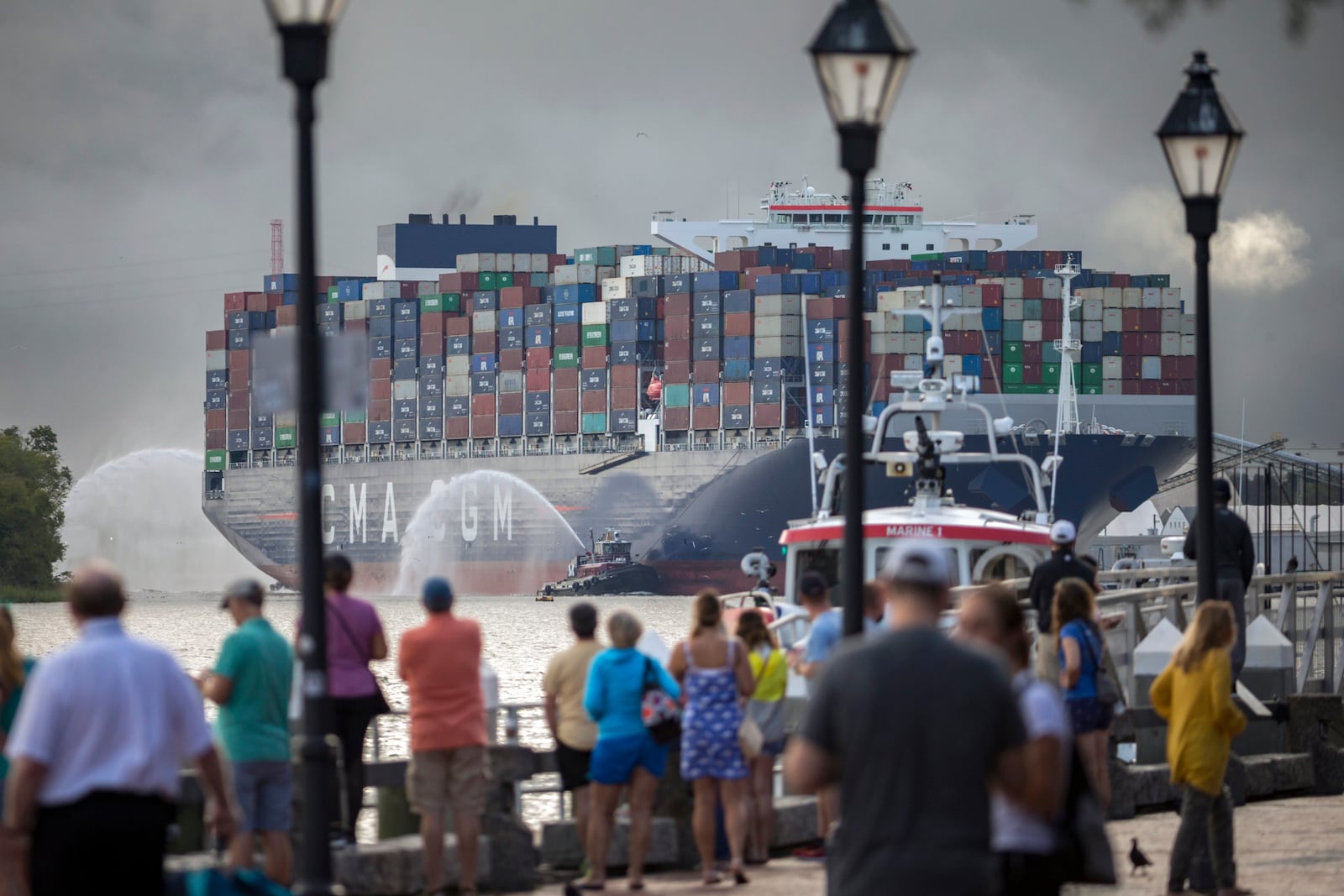 Spectators gather to watch the big container ship docking at the Port of Savannah, Friday, Sept., 18, 2020, in Savannah, Ga. (AJC Photo/Stephen B. Morton)