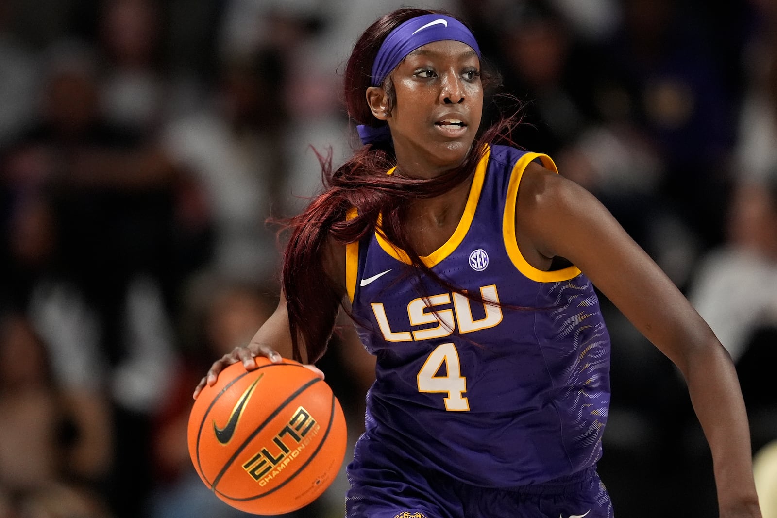 FILE - LSU guard Flau'jae Johnson (4) plays during the second half of an NCAA college basketball game against Vanderbilt, Thursday, Feb. 8, 2024, in Nashville, Tenn. (AP Photo/George Walker IV, File)