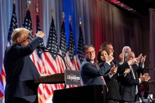 President-elect Donald Trump speaks at meeting of the House GOP conference, Wednesday, Nov. 13, 2024, in Washington. House Speaker Mike Johnson of La., second from left, applauds with Rep. Elise Stefanik, R-N.Y., Richard Hudson, R-N.C., Rep. Steve Scalise, R-La., and Rep. Tom Emmer, R-Minn. (AP Photo/Alex Brandon)