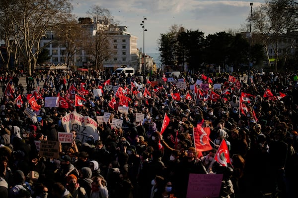 University students protest against the arrest of Istanbul's Mayor Ekrem Imamoglu, in Istanbul, Turkey, Friday, March 21, 2025. (AP Photo/Emrah Gurel)