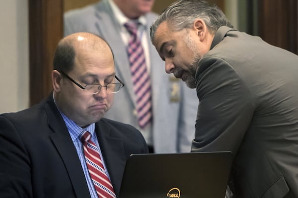 Justin Ross Harris defense attorney’s Bryan Lumpkin, left, and H. Maddox Kilgore, right, talk in court during a break in the murder trial. (Stephen B. Morton/Atlanta Journal-Constitution via AP, Pool)