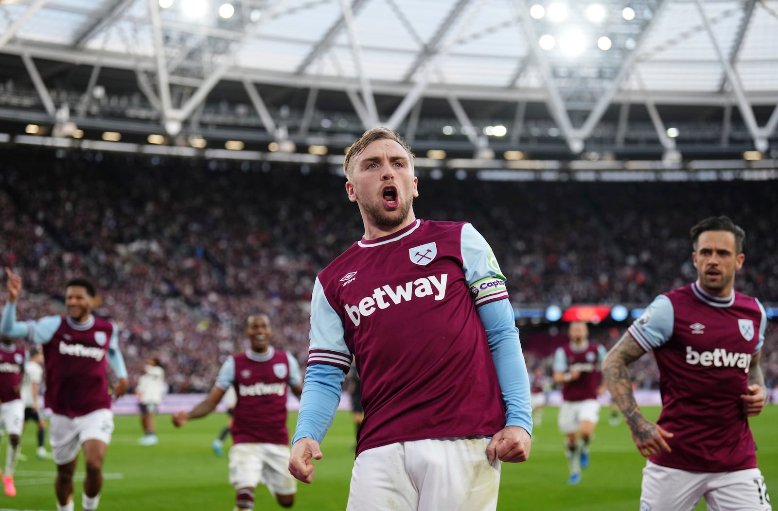 West Ham United's Jarrod Bowen celebrates scoring his side's second goal during the English Premier League soccer match between West Ham United and Manchester United at the London Stadium in London, Sunday, Oct. 27, 2024. (John Walton/PA via AP)