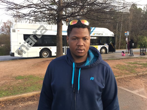 Randy Moon waits on the MARTA 800 bus at the Harold R. Banke Justice Center to take him to a job in the Lovejoy/Hampton area in Clayton County. He would like to see MARTA extend its hours on Saturdays. Photo credit: BRANDON FRANKLIN