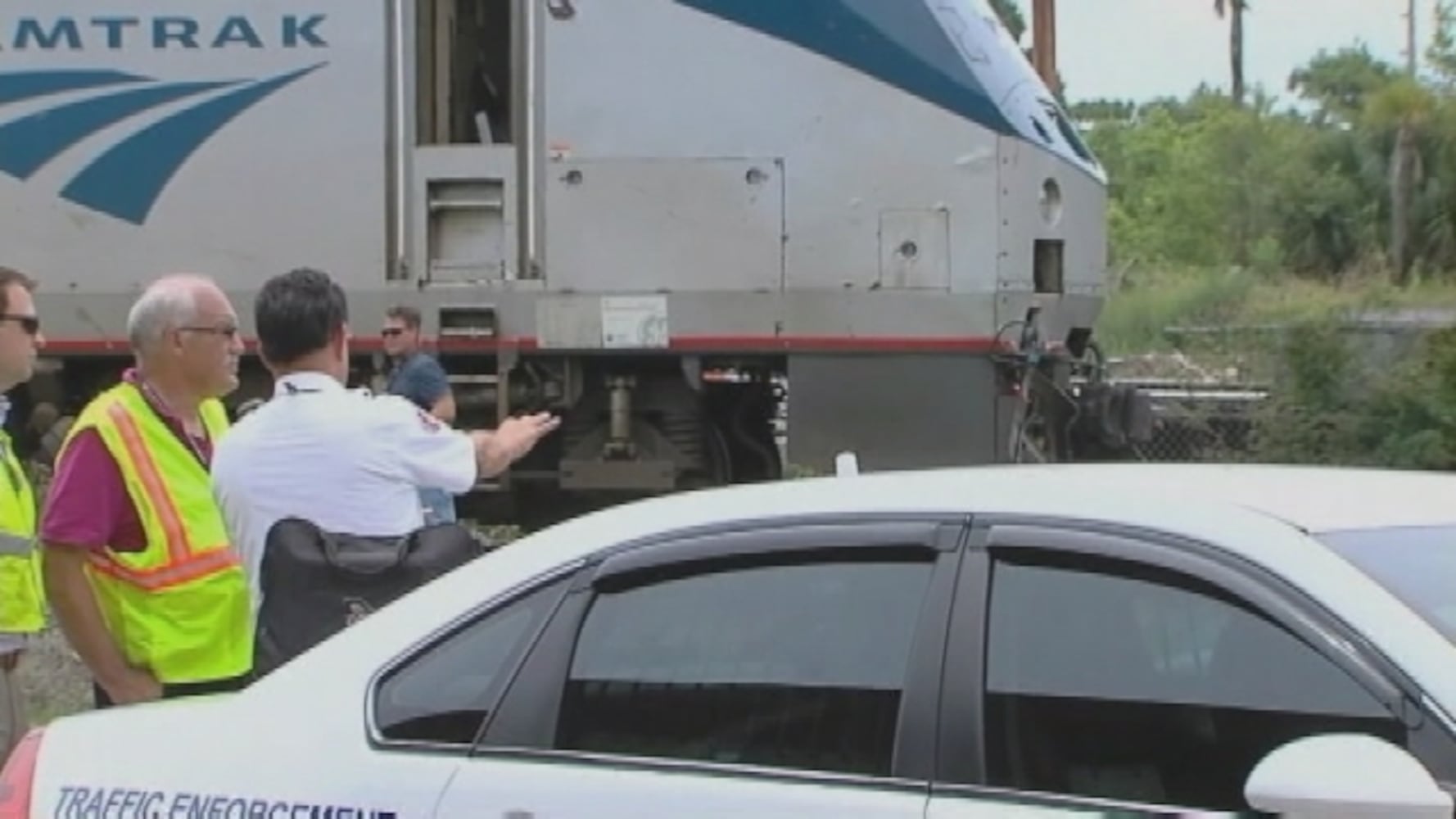 Amtrak train hits car on track