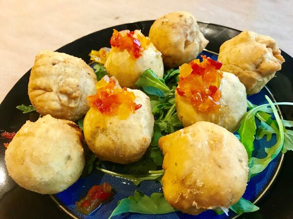 Instead of preparing jelly doughnuts, known as sufganiyah, for Hanukkah, chef Bruce Bogartz suggests taking a savory route with brie beignets. CONTRIBUTED BY LIGAYA FIGUERAS