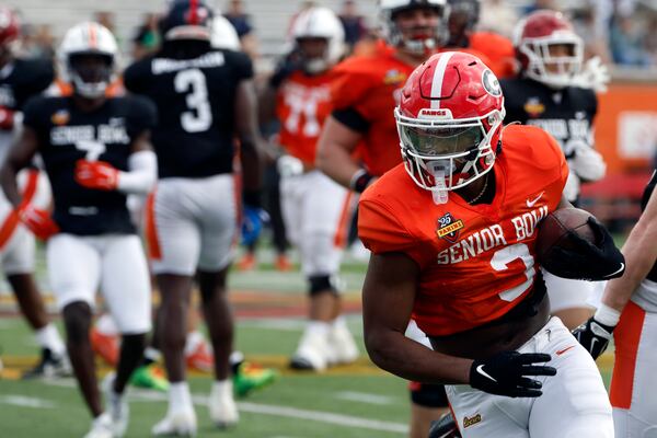 Former UGA running back Trevor Etienne takes a carry during Thursday's  Senior Bowl practice in Mobile.