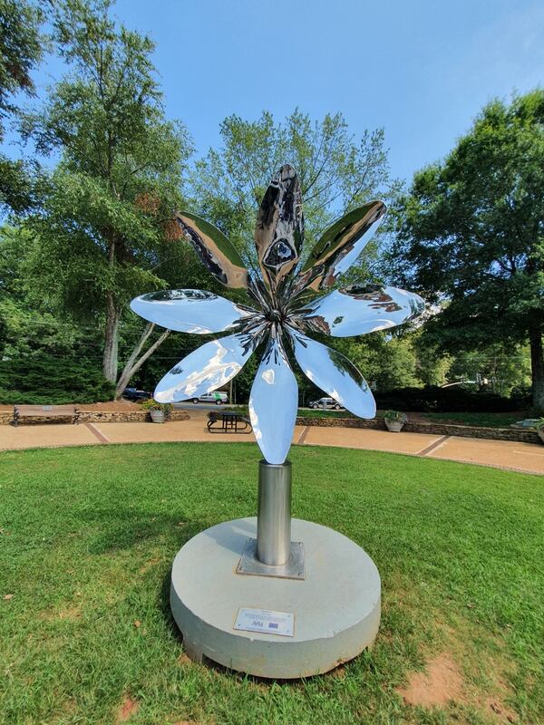 The fragile nature of a flower is explored in David Landis’ “Sentience,” displayed on Canton Street in Roswell. 
Courtesy of Cultural Gorilla.