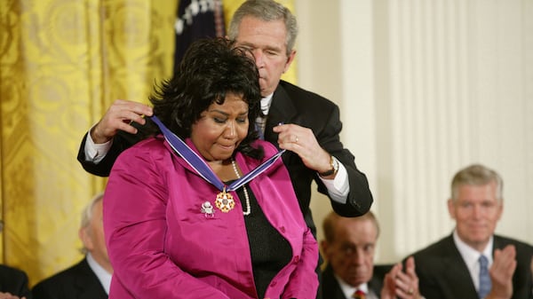 UNITED STATES - NOVEMBER 09:  Aretha L. Franklin and President George W. Bush at the Freedom Awards Ceremony at the White House in Washington D.C. on November 9, 2005.  (Photo by Douglas A. Sonders/Getty Images)