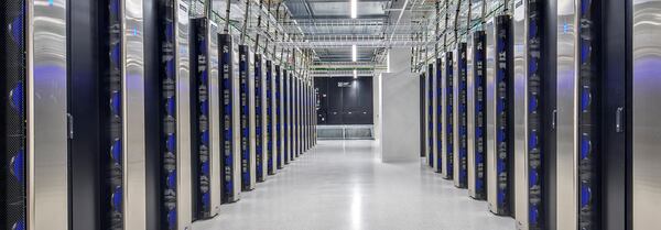 Rows of computer and cooling equipment manage and protect data within DataBank's ATL1 data center in Midtown. The data storage farm is located within Coda at Technology Square and was DataBank's first data center in metro Atlanta.