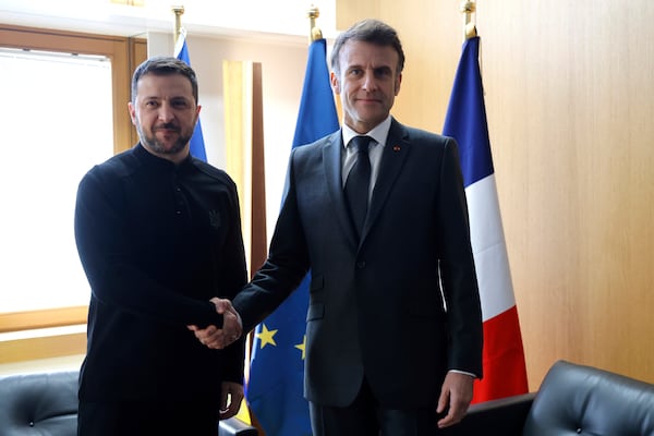 Ukraine's President Volodymyr Zelenskyy, left, meets French President Emmanuel Macron on the sidelines of the European Council to discuss continued support for Ukraine and European defense, in Brussels, Thursday, March 6, 2025. (Ludovic Marin, Pool via AP)