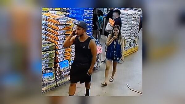 Police are seeking two suspects who were caught on camera stealing a snake from a pet store.