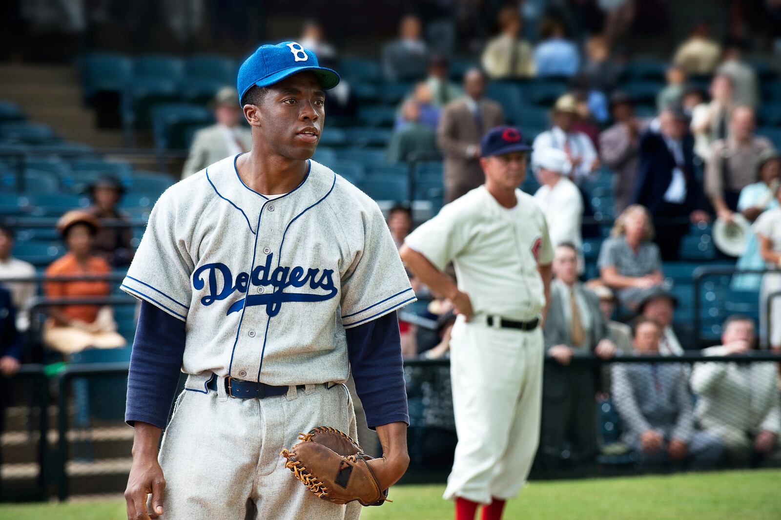 This film image released by Warner Bros. Pictures shows Chadwick Boseman as Jackie Robinson in a scene from "42."