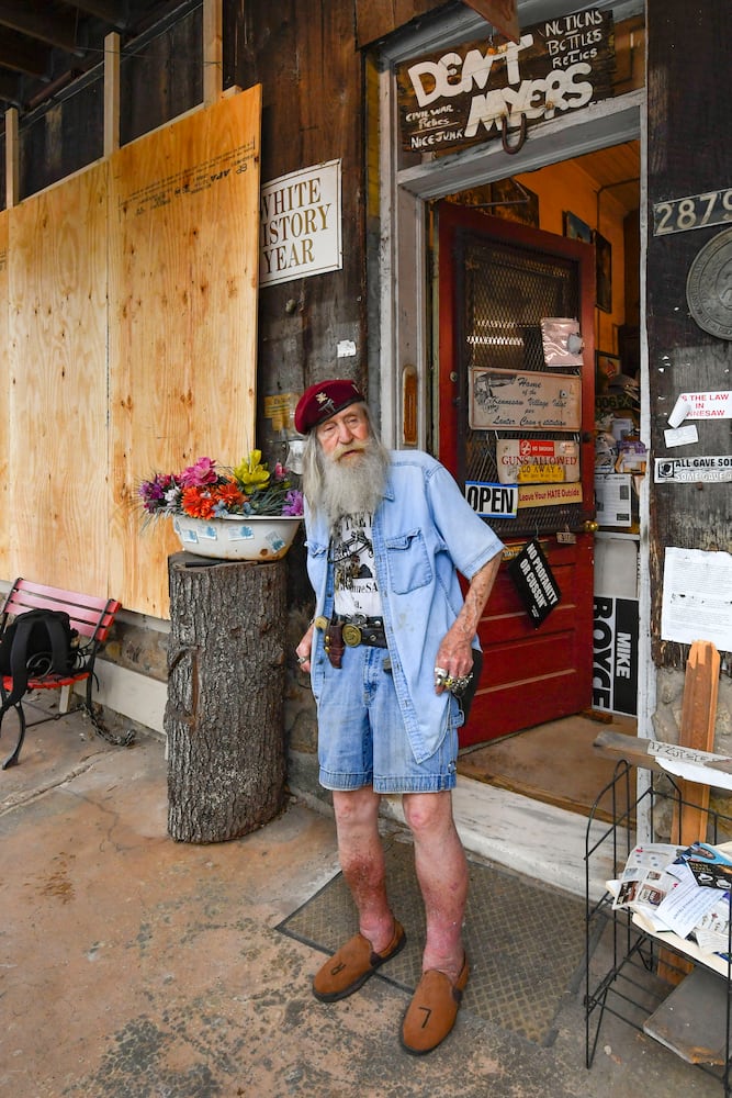 Dozens call for closure of Wildman’s Confederate memorabilia store in Kennesaw