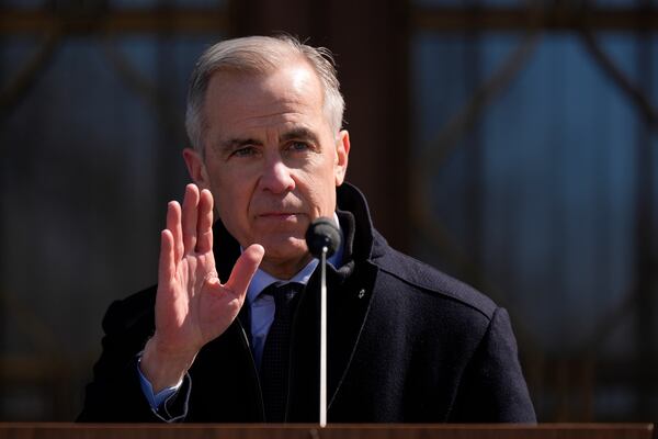 Prime Minister Mark Carney speaks to media at Rideau Hall, where he asked the Governor General to dissolve Parliament and call an election, in Ottawa, Sunday, March 23, 2025. (Adrian Wyld /The Canadian Press via AP)