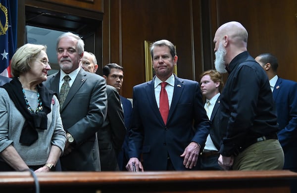 Gov. Brian Kemp enters for a press conference to provide an update on the state’s efforts regarding COVID-19, after reporting the first death in Georgia related to coronavirus, at the Georgia State Capitol on Thursday, March 11, 2020. HYOSUB SHIN / HYOSUB.SHIN@AJC.COM