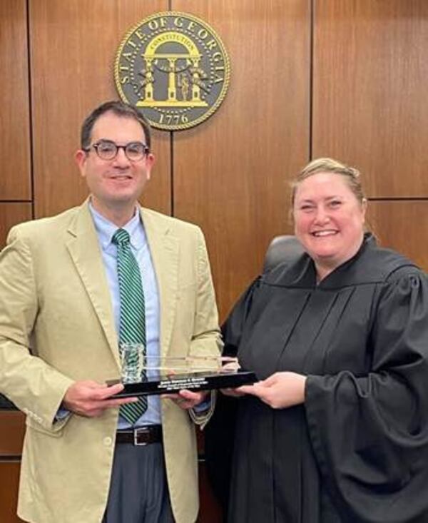 Cobb’s Chief Magistrate Judge Brendan F. Murphy (left) was named the Council of Magistrate Court Judges “2021 Workhorse of the Year.”