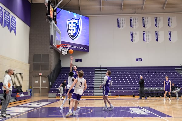 St. Thomas forward, Carter Bjerke (32) shoots during NCAA college basketball practice, Wednesday, Feb. 26, 2025, in St. Paul, Minn. (AP Photo/Abbie Parr)