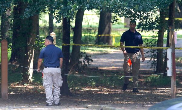 Authorities said parkgoers discovered the woman's body about 6:30 a.m. 