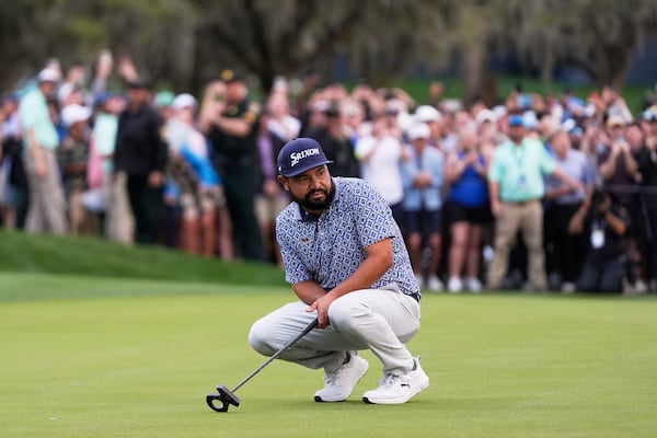 J.J. Spaun reacts after a putt on the 18th green during the final round of The Players Championship golf tournament Sunday, March 16, 2025, in Ponte Vedra Beach, Fla. (AP Photo/Julia Demaree Nikhinson)