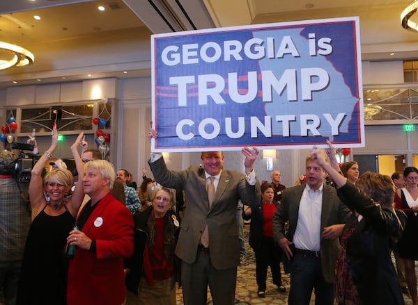 November 8,  2016, ATLANTA: Republican voters celebrate as it is projected Trump wins Georgia at the Republican Watch party at the Grand Hyatt, Buckhead, on Tuesday, Nov. 7, 2016, in Atlanta.    Curtis Compton /ccompton@ajc.com