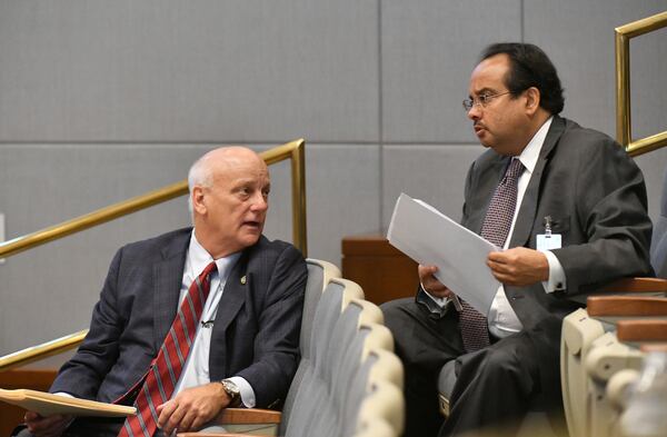 State Sen. Brandon Beach (right) was elected in 2024 to replace the late Michel "Marty" Turpeau IV (right) as chairman of the Development Authority of Fulton County. Beach has announced he is stepping down. Turpeau died in late 2023.  Hyosub Shin/AJC 2021