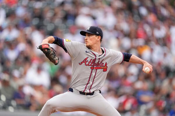 Atlanta Braves starting pitcher Max Fried works against the Colorado Rockies in the first inning of a baseball game Saturday, Aug. 10, 2024, in Denver. (AP Photo/David Zalubowski)