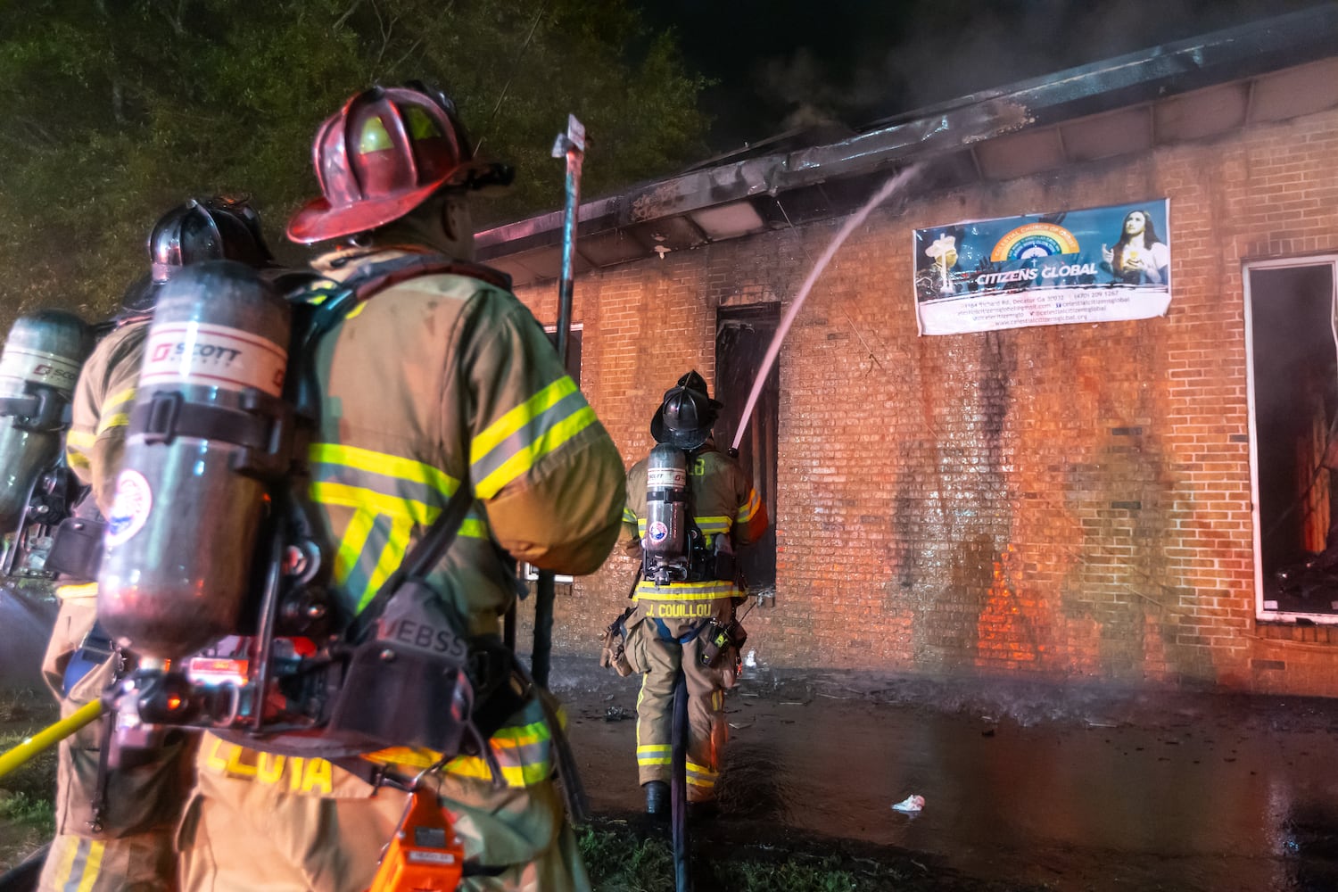 DeKalb County firefighters battle a blaze at the Celestial Citizens Global church Friday, April 19, 2024. No one was injured. The cause remains under investigation.  The 50-member congregation has to figure out where to gather for worship. “God is going to always find a way,” Pastor Oluremi Fesojaye. (Photo by John Spink/AJC)