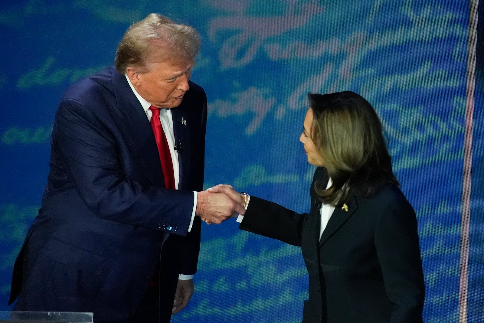 Republican presidential nominee former President Donald Trump and Democratic presidential nominee Vice President Kamala Harris shake hands before the start of an ABC News presidential debate at the National Constitution Center, Tuesday, Sept. 10, 2024, in Philadelphia. (AP Photo/Alex Brandon)