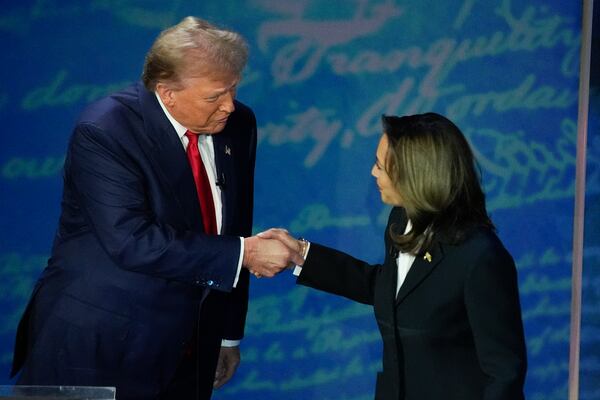 Republican presidential nominee former President Donald Trump and Democratic presidential nominee Vice President Kamala Harris shake hands before the start of an ABC News presidential debate at the National Constitution Center, Tuesday, Sept. 10, 2024, in Philadelphia. (AP Photo/Alex Brandon)