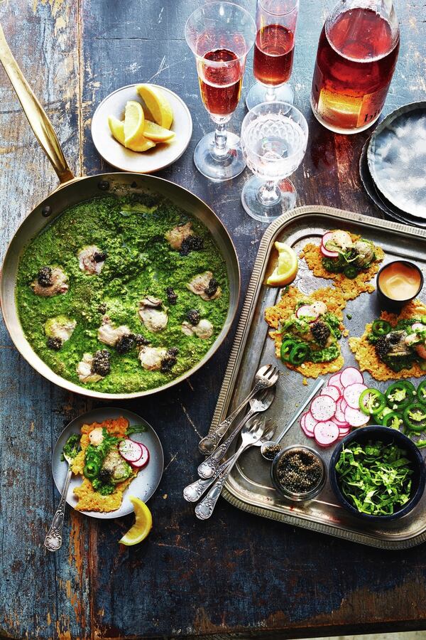 Oysters Poached in Collard Green Pesto on Cheese Crisps with Caviar from “Soul” by Todd Richards. Courtesy of Time Inc. Books/Caitlin Bensel