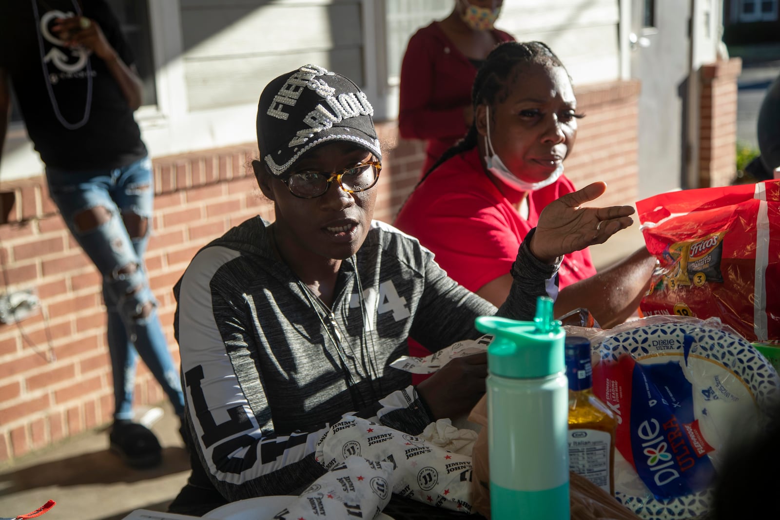 Miracle Fletcher speaks during a meeting of the tenants' association at Trestletree Village in Atlanta last fall. Fletcher has sued the complex's management company, alleging she was retaliated against for helping organize her neighbors over substandard living conditions.  (Alyssa Pointer/ AJC)