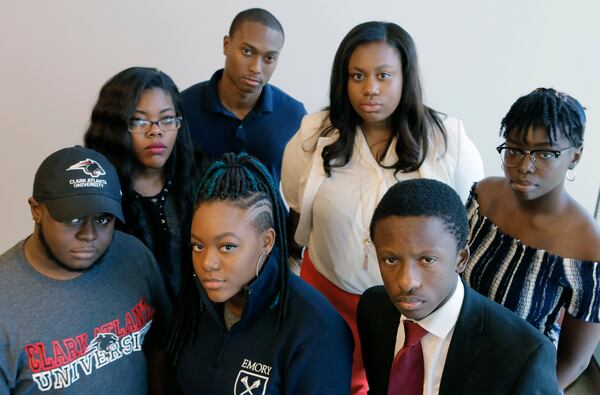 The AJC invited seven black college students to discuss the Netflix series "Dear White People." Front row: Antonio D. Curren Jr. (Clark Atlanta); Chelsea Jackson (Emory) and Jared Sawyer Jr. (Morehouse). Back row: Lauren Booker (GSU); DJ Lewis (Ga. Tech); Mary Pat Hector (Spelman) and Meagan Mwanda (UGA). (BOB ANDRES  /BANDRES@AJC.COM)